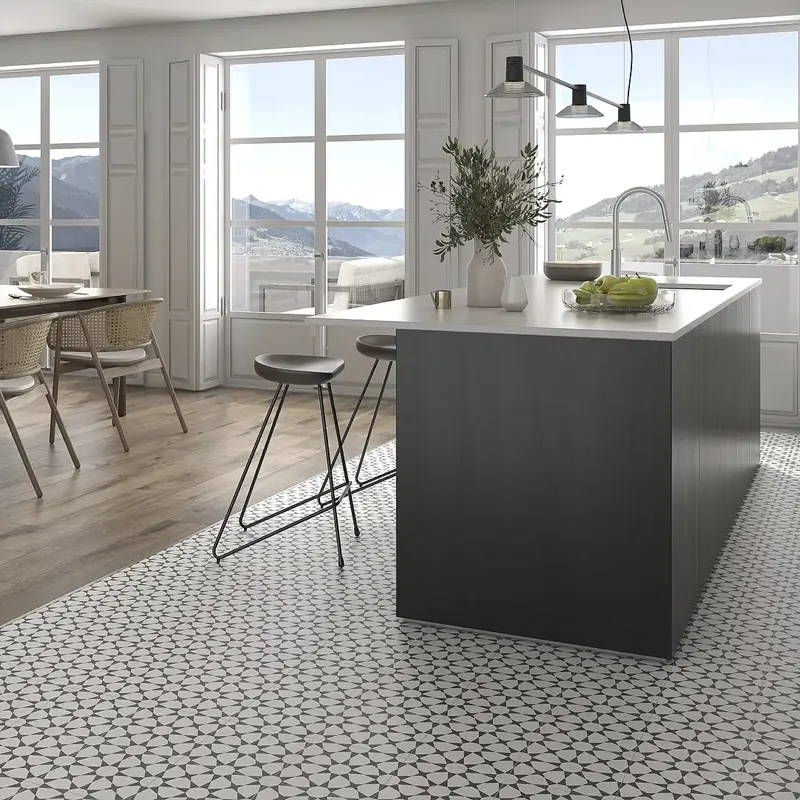 azulejo para cozinha barato combinando designs de efeito natural e peças com padrões decorativos, separando visualmente os espaços.